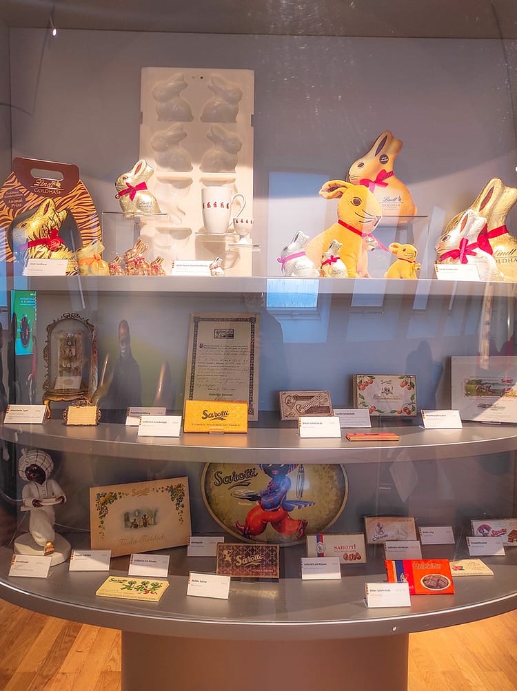 Display of chocolate related artifacts throughout the ages, such as the Lindt bunny rabbit