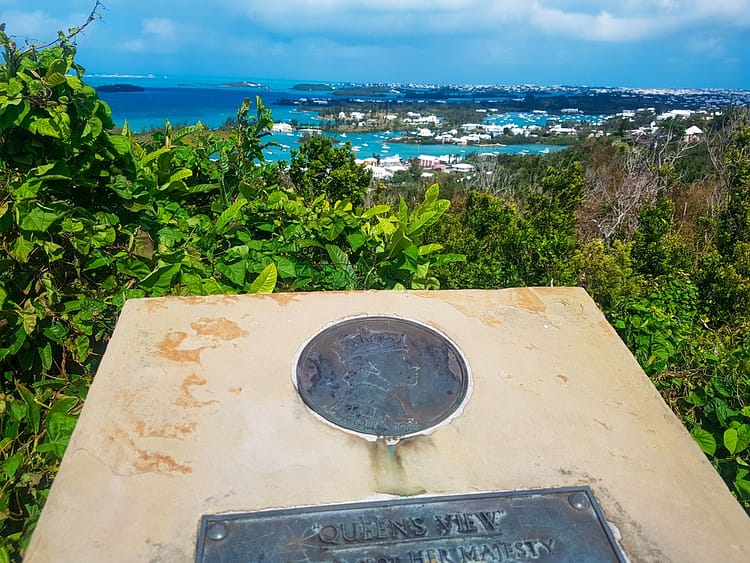View overlooking Bermuda island from plaque stating "Queens View" at Gibbs Hill Lighthouse.