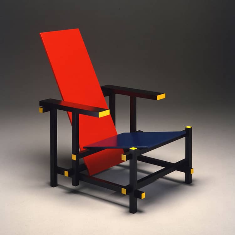De Stjil style chair in red, blue, black and yellow, Red and Blue Chair (1923) by Gerrit Rietveld